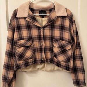 Brown jacket with fur/rugged collar